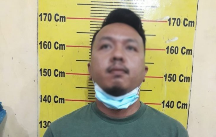 Suami penganiaya