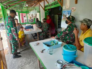 Anggota Satgas TMMD Menikmati Waktu Di Hari Akhir Penugasan