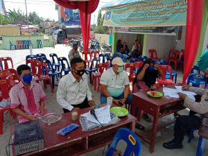 Polres Asahan Vaksinasi 492 Orang Dosis I dan II di Balai Desa Simpang Empat