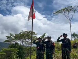 Tanamkan Persatuan dan Cinta Tanah Air, Satgas Kewilayah Yonif 410/Alugoro Gelar Pemasangan Bendera Merah Putih Serentak di Distrik Wilayah Penugasan