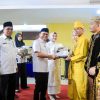 Hadiri Nikah Massal 23 Pasangan, Zakiyuddin Harahap Serahkan Buku Nikah dan Hadiah Uang Saku Bagi Pengantin